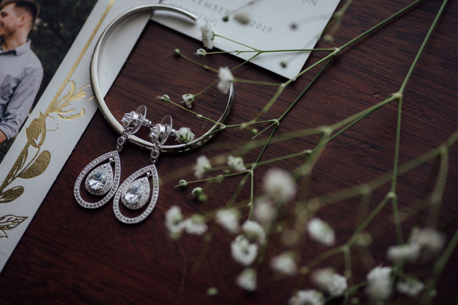Rochester wedding photographer - lay flat - Wedding earrings